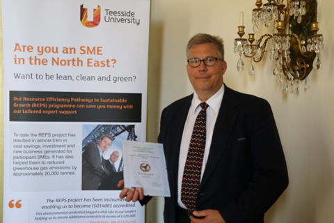 Operations Manager, John Auger, with the REPS award certificate Operations Manager, John Auger, with the REPS award certificate